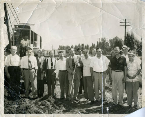 Men at a groundbreaking ceremony for an addition to the Dearborn mosque