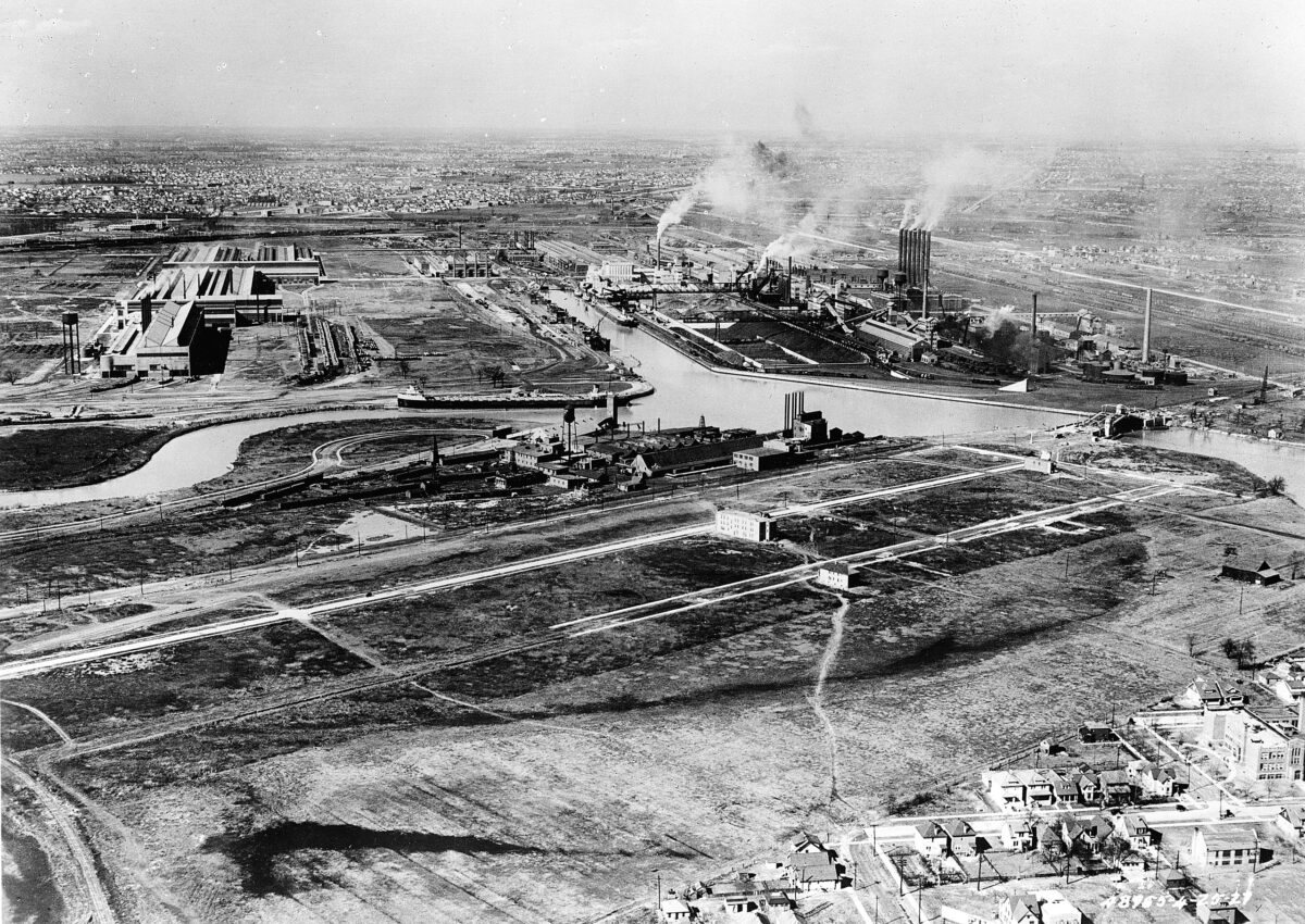 Black and white photo of the Ford Rouge plant, showing the Rouge River and industrial facilities